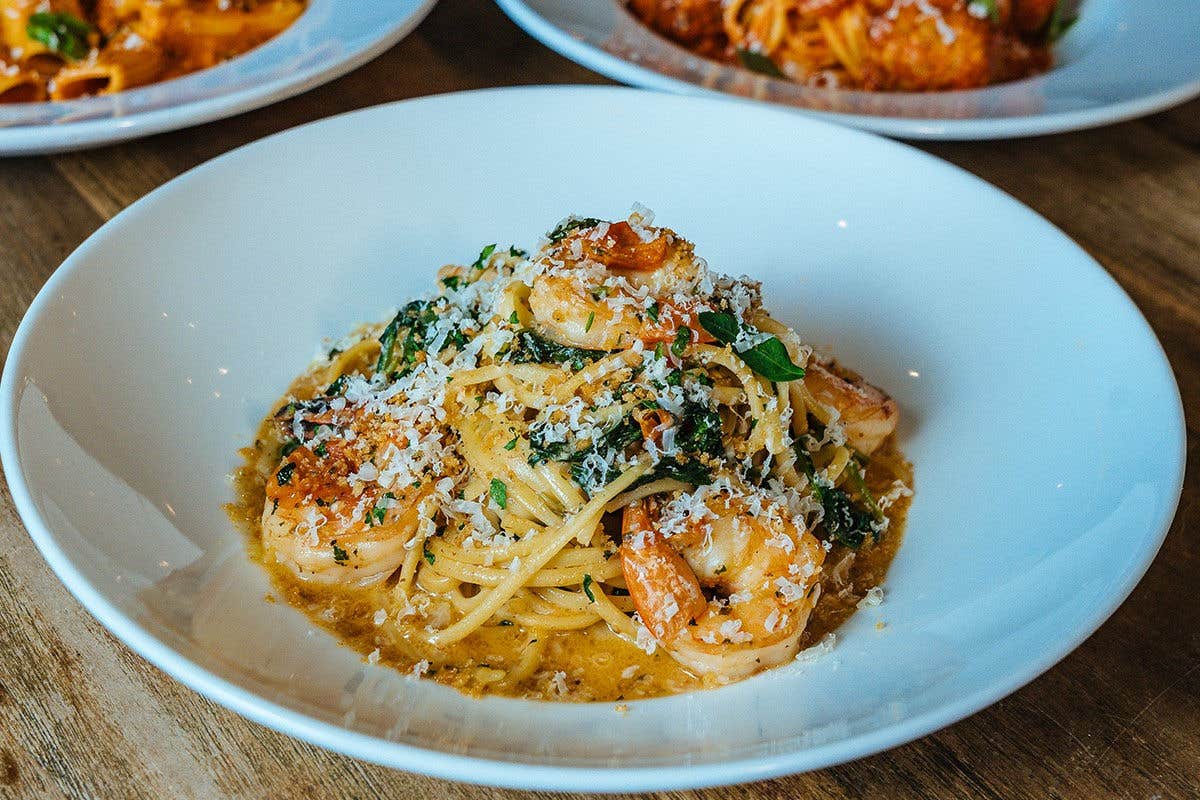 White bowl full of shrimp scampi