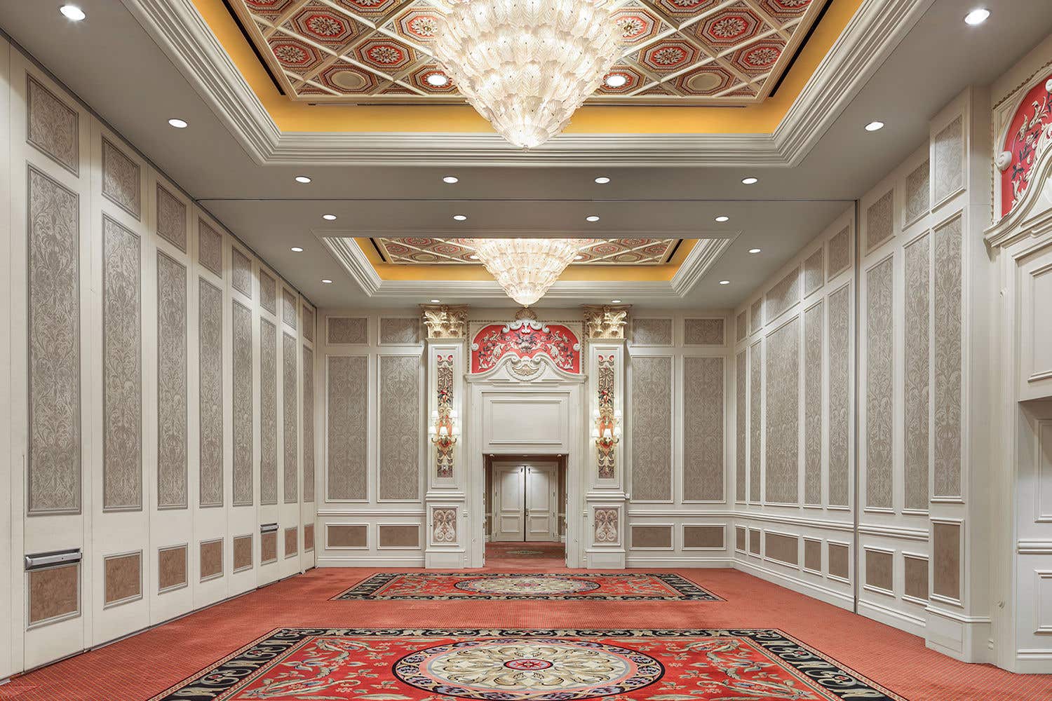 A smaller space at the Venetian Resort with two chandeliers and beautiful decor 