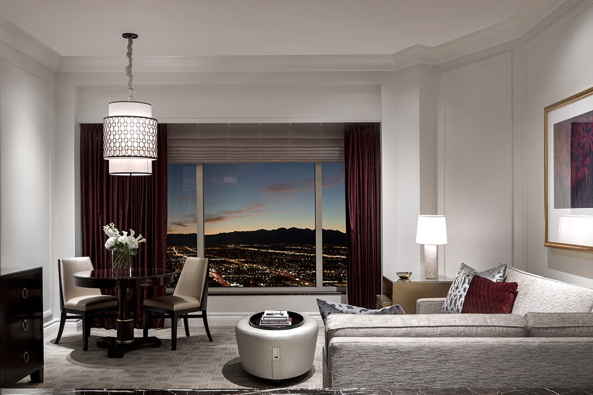 A well-appointed living room in a Venetian King Suite