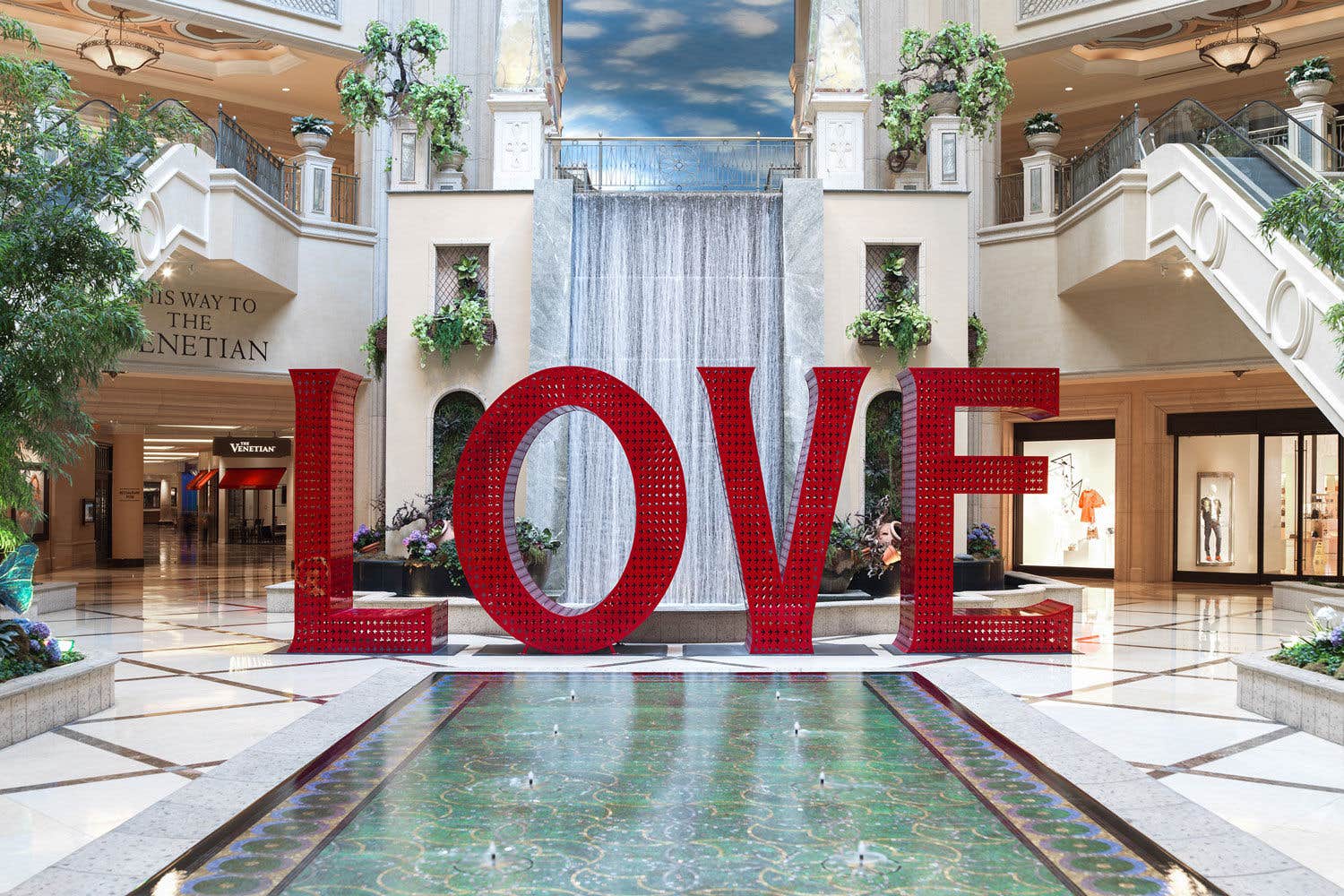 Love statue in a lobby.