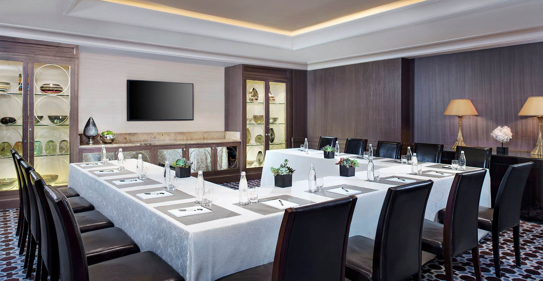 A Prestige Lounge with a conference table in a U shape