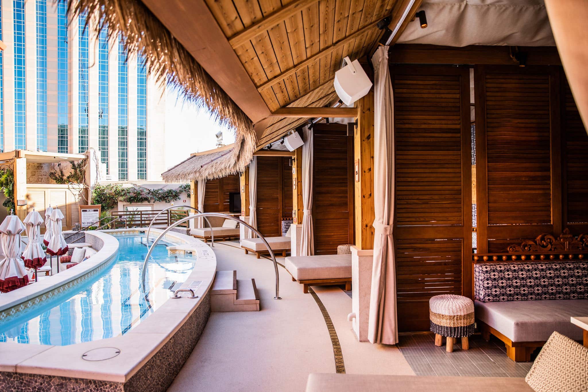 Four Cabanas alongside a pool at Tao Beach Dayclub 