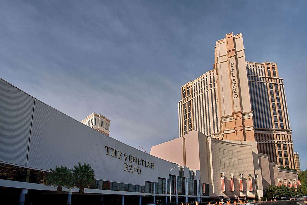 View of The Venetian Expo and Palazzo Hotel with blue sky background in Las Vegas.