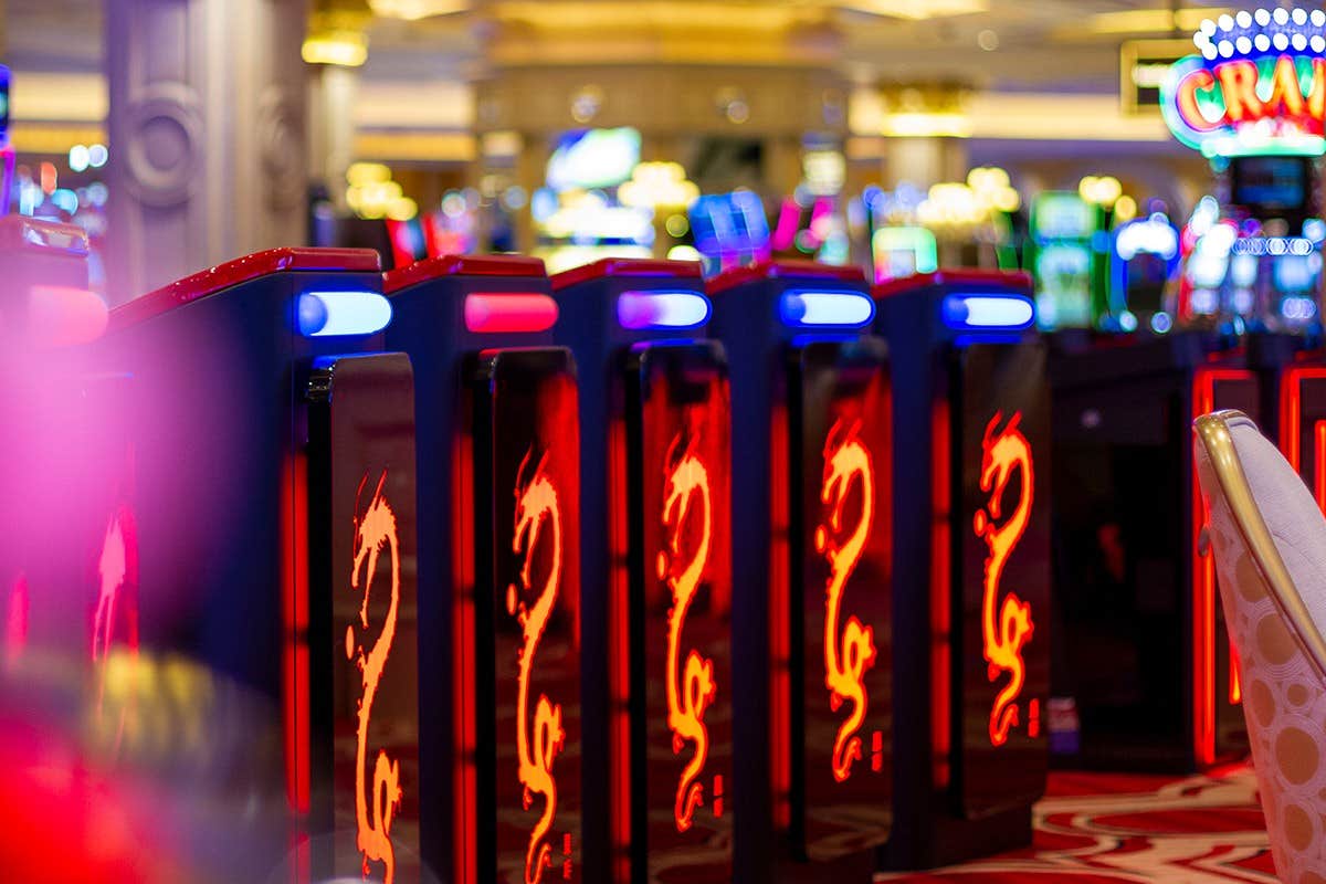 The backs of neon-coloured electronic table games