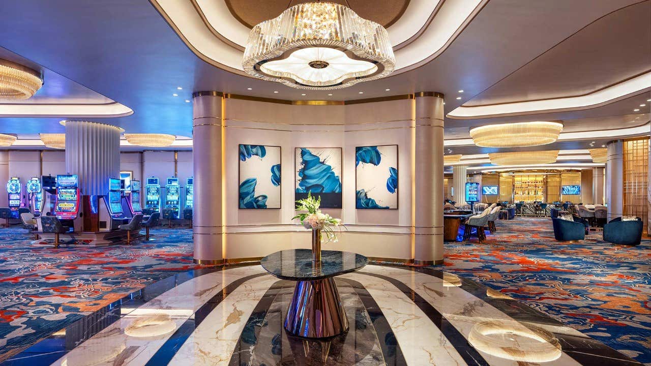 Foyer of the casino with views of the table game area and the slot machine area