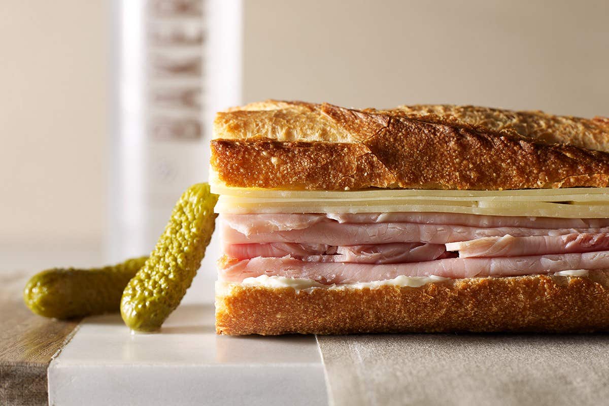 Ham and cheese baguette with a pickle