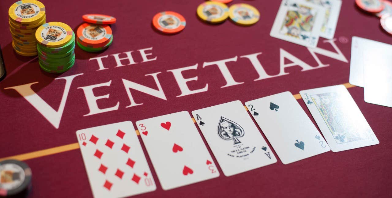 The Venetian poker table with chips and cards