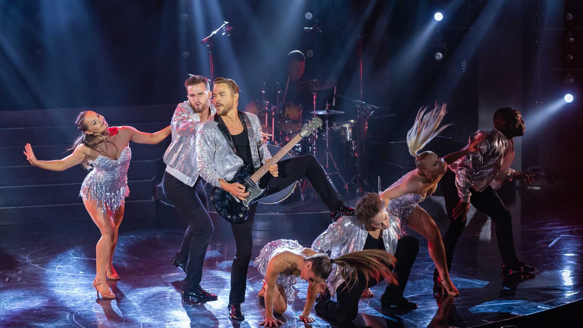 Derek Hough doesn’t just dance—he grabs the microphone and sings in this Las Vegas show!
